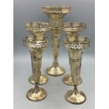 A Set of five silver graduated vases, hallmarked Birmingham 1915, makers mark HM, Henry Matthews.