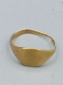 A hallmarked gold signet ring