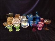 A large selection of collectable glass including crackle ware.