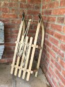 A Vintage children's sledge 82cm long