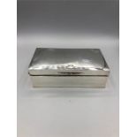 A silver Cigarette box, hallmarked and makers mark P & B