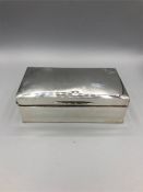 A silver Cigarette box, hallmarked and makers mark P & B