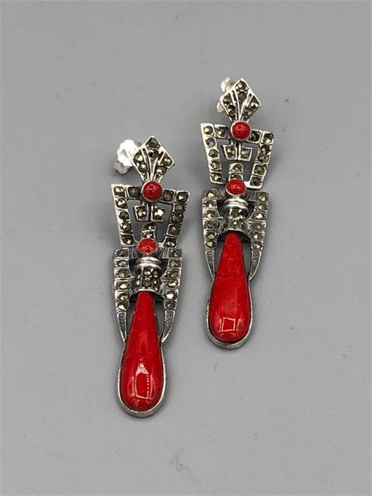 A Pair of Silver Marcasite and apple coral drop earrings