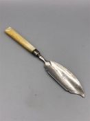 A hallmarked silver fish knife with mother of pearl handle