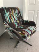 A Vintage swivel chair 80cm wide x 84 cm deep