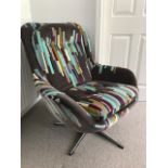 A Vintage swivel chair 80cm wide x 84 cm deep