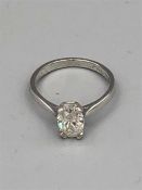 An 18ct white gold oval shaped solitaire diamond of 1.7ct's