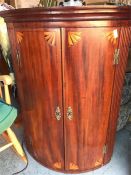 A corner cabinet with inlay decoration