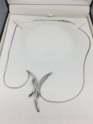 A White gold necklace in 9ct white gold with diamonds (Total Weight 5.6g)