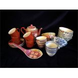 A selection of Chinese ware to include teapots, sake cups, tea cups and saucers