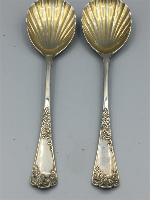 Two silver, shell bowled spoons, hallmarked London 1901, makers mark GJDF.