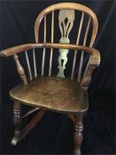 A Child's oak Rocking Chair