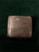 A Silver cigarette case, hallmarked 1944