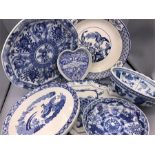 A selection of blue and white china to include bowls, plates and dishes