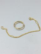 Pair of 9ct gold earring (1.1g) and necklace marked 750 (4.5g)