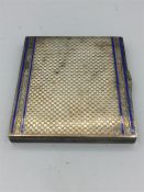 A silver cigarette case with blue enamel, hallmarked Birmingham 1905 (Import)