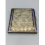 A silver cigarette case with blue enamel, hallmarked Birmingham 1905 (Import)