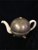A 1920's Teapot and warmer