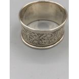 A silver napkin ring