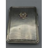 A hallmarked silver cigarette case, East Yorkshire regiment.