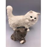 A Pair of Royal Doulton China Cats