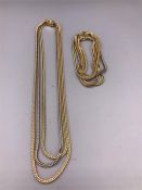 A 14ct Three colour gold necklace and bracelet set (72.5g)