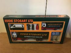 A Corgi diecast Eddie Stobart, Volvo Container Truck, Ford cargo truck and van and figures.