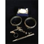 A selection of silver items to include bracelet by W Right Jewellers, pen, two wide silver