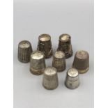 A selection of eight silver thimbles