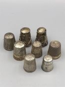 A selection of eight silver thimbles