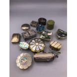A selection of pill boxes, mainly silver
