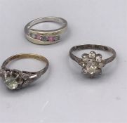 A 9ct gold ring and two antique silver rings.