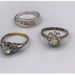 A 9ct gold ring and two antique silver rings.