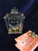 A 24 Hour brass clock