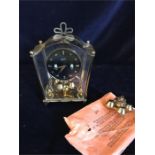 A 24 Hour brass clock