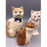 Three Decorative china cats