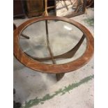 A Mid Century circular glass topped coffee table