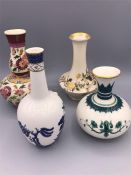 A selection of miniature decorative vases to include Royal Doulton, Worcester and Hadleys.
