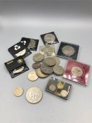 A selection of coins to include Crowns etc