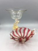 A Murano Dolphon stemed comport with gold foil inclusions & label and a candle holder Aventurine