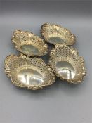 A set of four small pierced J.D & S bonbon dishes hallmarked Sheffield 1896 (121g)