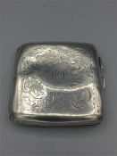 A silver cigarette case