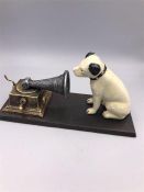 A Cast Iron HMV dog with a gramaphone
