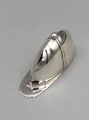 A silver vesta case in the form of a jockeys cap