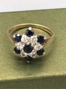 A Sapphire and CZ ring on 9ct gold