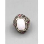 A Substantial silver marcasite ruby and central opal ring