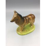 A Vintage Wade figure of a Sheltie dog.