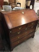 An oak Bureau two over three drawers