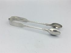 A pair of hallmarked silver sugar tongs London 1867