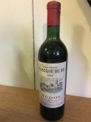 A Bottle of Chateau La Roque De By Medoc
